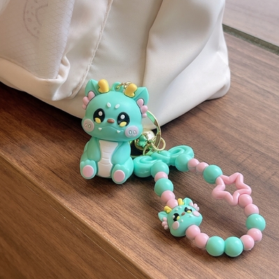 3.5cm*5cm PVC ドラゴンキーチェーンの 可愛い小さなプレゼント バックパックに掛けるチェーンが含まれています