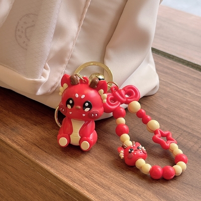 3.5cm*5cm PVC ドラゴンキーチェーンの 可愛い小さなプレゼント バックパックに掛けるチェーンが含まれています